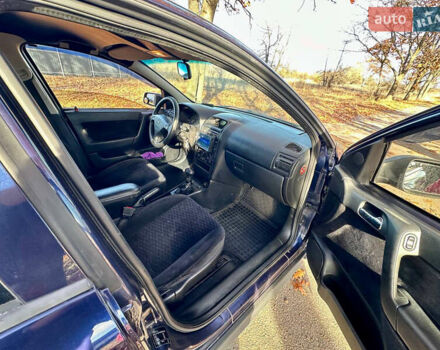 Синій Опель Астра, об'ємом двигуна 1.8 л та пробігом 220 тис. км за 3600 $, фото 16 на Automoto.ua