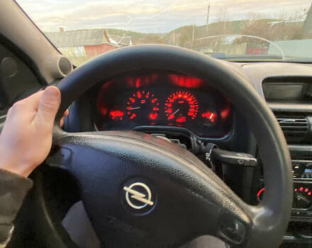 Синий Опель Астра, объемом двигателя 1.39 л и пробегом 243 тыс. км за 2500 $, фото 3 на Automoto.ua