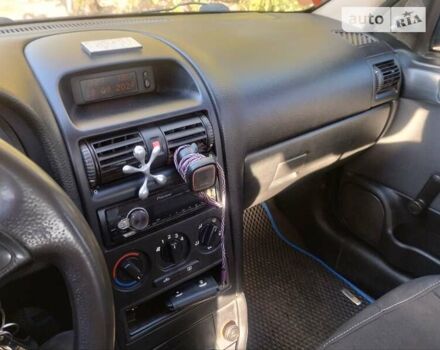 Синий Опель Астра, объемом двигателя 1.4 л и пробегом 270 тыс. км за 2900 $, фото 6 на Automoto.ua