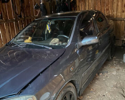 Синий Опель Астра, объемом двигателя 1.39 л и пробегом 243 тыс. км за 2500 $, фото 2 на Automoto.ua