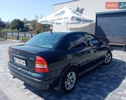 Синий Опель Астра, объемом двигателя 2.2 л и пробегом 299 тыс. км за 2650 $, фото 1 на Automoto.ua