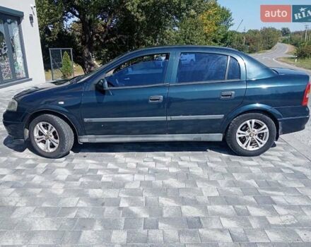 Синий Опель Астра, объемом двигателя 2.2 л и пробегом 299 тыс. км за 2650 $, фото 2 на Automoto.ua