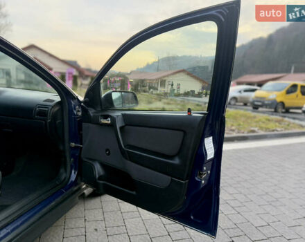 Синий Опель Астра, объемом двигателя 1.4 л и пробегом 170 тыс. км за 3650 $, фото 53 на Automoto.ua