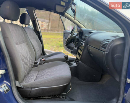 Синий Опель Астра, объемом двигателя 1.4 л и пробегом 170 тыс. км за 3650 $, фото 49 на Automoto.ua