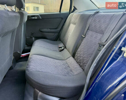 Синий Опель Астра, объемом двигателя 1.4 л и пробегом 170 тыс. км за 3650 $, фото 45 на Automoto.ua