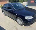 Синий Опель Астра, объемом двигателя 1.4 л и пробегом 218 тыс. км за 4200 $, фото 1 на Automoto.ua