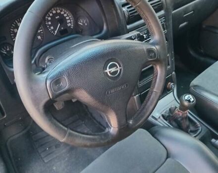 Синий Опель Астра, объемом двигателя 1.6 л и пробегом 225 тыс. км за 2999 $, фото 6 на Automoto.ua