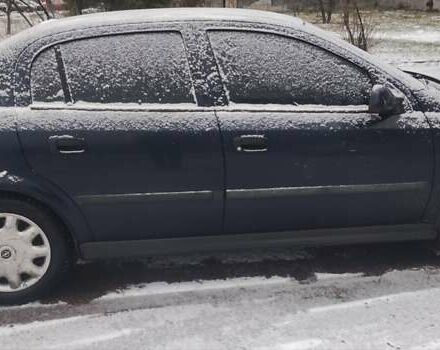 Синий Опель Астра, объемом двигателя 1.2 л и пробегом 265 тыс. км за 2850 $, фото 3 на Automoto.ua