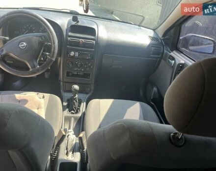 Синий Опель Астра, объемом двигателя 1.4 л и пробегом 218 тыс. км за 4200 $, фото 8 на Automoto.ua