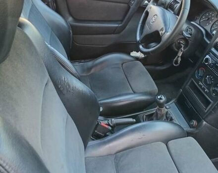 Синий Опель Астра, объемом двигателя 1.6 л и пробегом 225 тыс. км за 2999 $, фото 7 на Automoto.ua