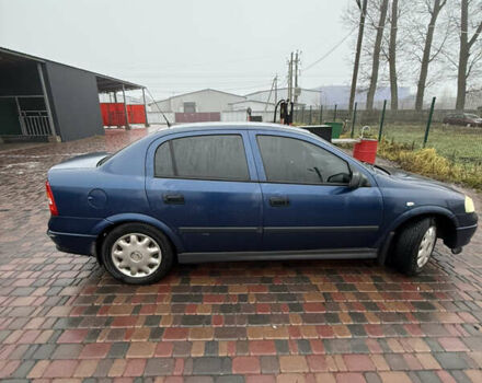 Синий Опель Астра, объемом двигателя 1.39 л и пробегом 210 тыс. км за 3299 $, фото 6 на Automoto.ua