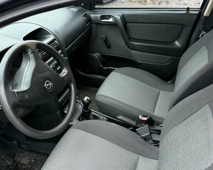 Синий Опель Астра, объемом двигателя 1.39 л и пробегом 210 тыс. км за 3299 $, фото 17 на Automoto.ua