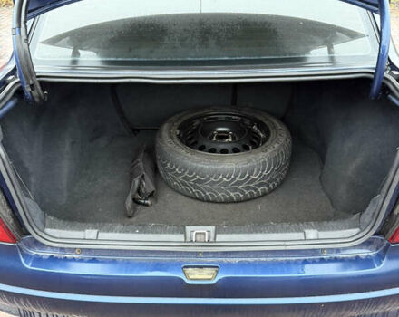 Синий Опель Астра, объемом двигателя 1.39 л и пробегом 210 тыс. км за 3299 $, фото 13 на Automoto.ua