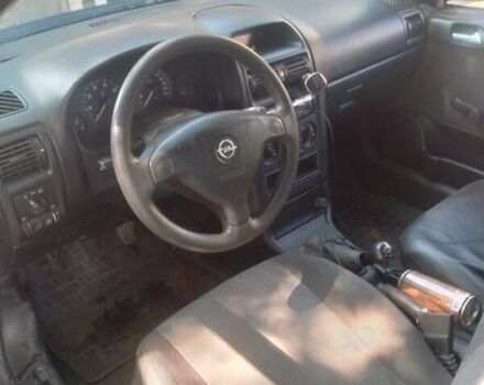 Синий Опель Астра, объемом двигателя 1.4 л и пробегом 180 тыс. км за 3200 $, фото 4 на Automoto.ua