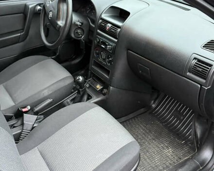 Синий Опель Астра, объемом двигателя 1.39 л и пробегом 210 тыс. км за 3299 $, фото 19 на Automoto.ua