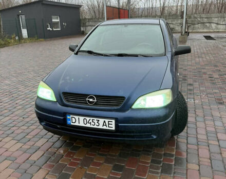 Синий Опель Астра, объемом двигателя 1.39 л и пробегом 210 тыс. км за 3299 $, фото 1 на Automoto.ua