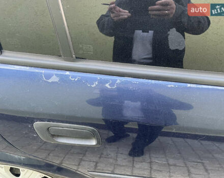 Синий Опель Астра, объемом двигателя 1.39 л и пробегом 330 тыс. км за 3100 $, фото 6 на Automoto.ua