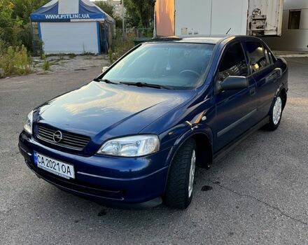 Синий Опель Астра, объемом двигателя 1.4 л и пробегом 248 тыс. км за 3550 $, фото 1 на Automoto.ua