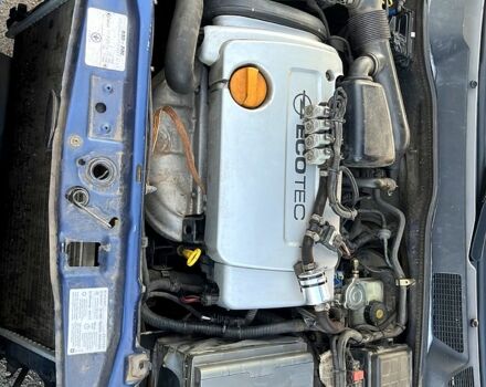 Синий Опель Астра, объемом двигателя 1.4 л и пробегом 248 тыс. км за 3550 $, фото 3 на Automoto.ua