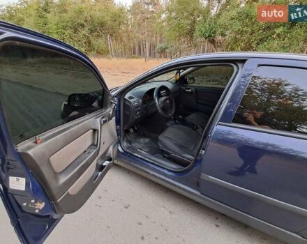 Синий Опель Астра, объемом двигателя 1.36 л и пробегом 250 тыс. км за 3599 $, фото 6 на Automoto.ua