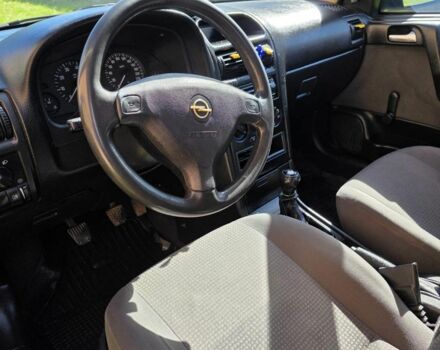 Синий Опель Астра, объемом двигателя 1.4 л и пробегом 227 тыс. км за 2650 $, фото 15 на Automoto.ua