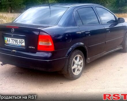 Синий Опель Астра, объемом двигателя 1.4 л и пробегом 208 тыс. км за 2600 $, фото 4 на Automoto.ua