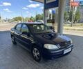 Синий Опель Астра, объемом двигателя 1.39 л и пробегом 270 тыс. км за 4000 $, фото 4 на Automoto.ua