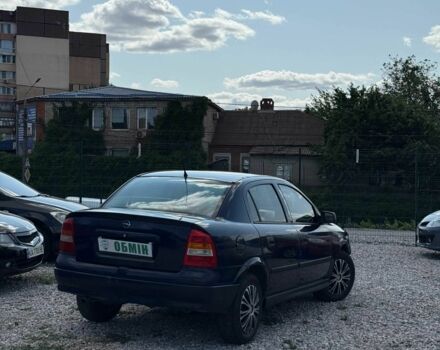 Синий Опель Астра, объемом двигателя 1.4 л и пробегом 284 тыс. км за 2550 $, фото 1 на Automoto.ua