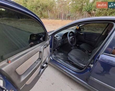 Синий Опель Астра, объемом двигателя 1.36 л и пробегом 250 тыс. км за 3599 $, фото 4 на Automoto.ua