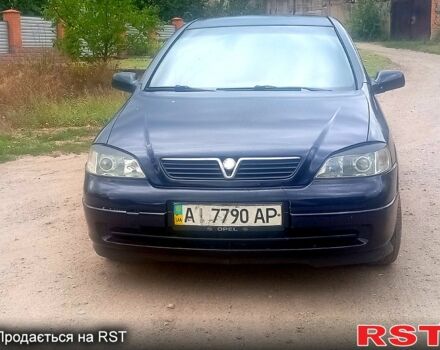 Синий Опель Астра, объемом двигателя 1.4 л и пробегом 208 тыс. км за 2600 $, фото 2 на Automoto.ua