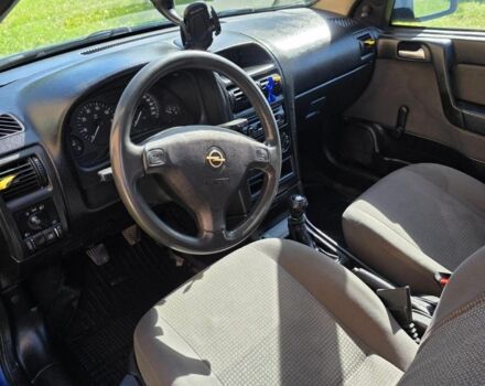 Синий Опель Астра, объемом двигателя 1.4 л и пробегом 227 тыс. км за 2650 $, фото 10 на Automoto.ua