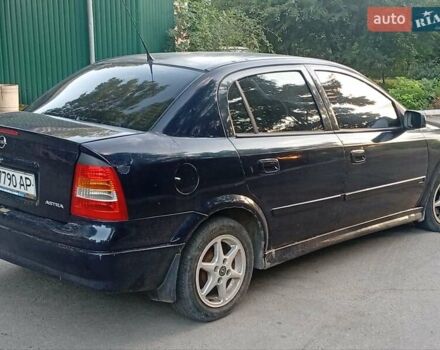 Синий Опель Астра, объемом двигателя 1.4 л и пробегом 208 тыс. км за 2700 $, фото 6 на Automoto.ua