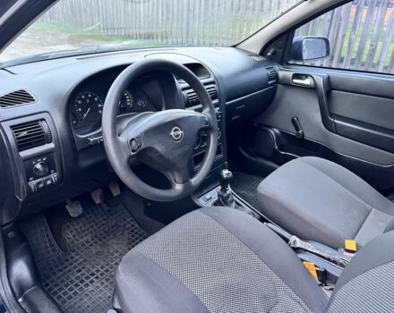 Синій Опель Астра, об'ємом двигуна 1.4 л та пробігом 250 тис. км за 2476 $, фото 5 на Automoto.ua