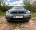 Синий Опель Астра, объемом двигателя 1.6 л и пробегом 248 тыс. км за 4100 $, фото 1 на Automoto.ua