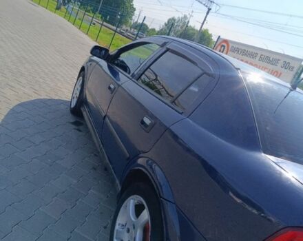 Синий Опель Астра, объемом двигателя 1.4 л и пробегом 213 тыс. км за 2200 $, фото 1 на Automoto.ua