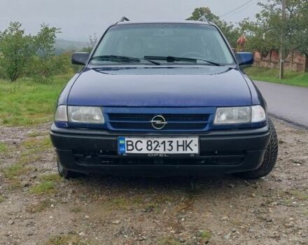 Синий Опель Астра, объемом двигателя 1.6 л и пробегом 250 тыс. км за 900 $, фото 1 на Automoto.ua