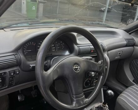 Синій Опель Астра, об'ємом двигуна 2 л та пробігом 250 тис. км за 597 $, фото 6 на Automoto.ua