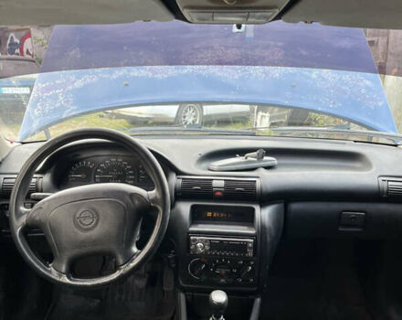 Синий Опель Астра, объемом двигателя 1.6 л и пробегом 200 тыс. км за 1650 $, фото 4 на Automoto.ua