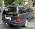 Синий Опель Астра, объемом двигателя 1.69 л и пробегом 400 тыс. км за 2100 $, фото 1 на Automoto.ua
