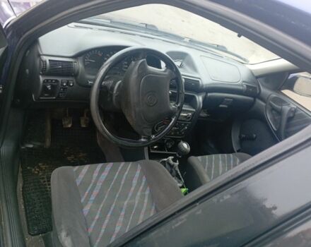 Синий Опель Астра, объемом двигателя 1.6 л и пробегом 278 тыс. км за 1550 $, фото 6 на Automoto.ua