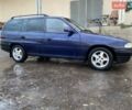 Синий Опель Астра, объемом двигателя 1.6 л и пробегом 250 тыс. км за 1450 $, фото 1 на Automoto.ua