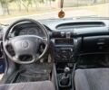 Синий Опель Астра, объемом двигателя 1.6 л и пробегом 250 тыс. км за 3000 $, фото 15 на Automoto.ua