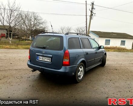 Синий Опель Астра, объемом двигателя 1.4 л и пробегом 360 тыс. км за 2300 $, фото 7 на Automoto.ua