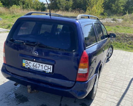 Синий Опель Астра, объемом двигателя 2 л и пробегом 334 тыс. км за 2200 $, фото 2 на Automoto.ua
