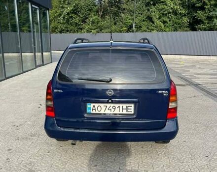 Синий Опель Астра, объемом двигателя 1.7 л и пробегом 370 тыс. км за 2100 $, фото 1 на Automoto.ua