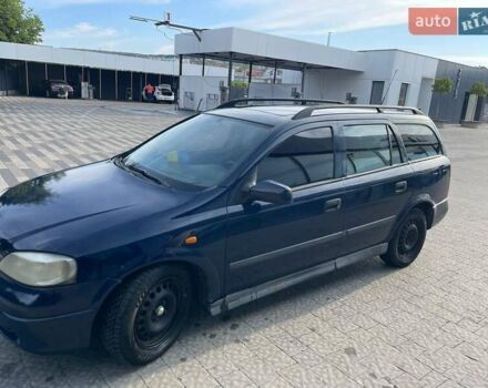 Синий Опель Астра, объемом двигателя 1.7 л и пробегом 370 тыс. км за 2100 $, фото 4 на Automoto.ua