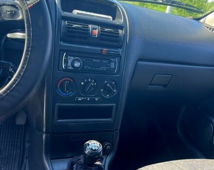 Синий Опель Астра, объемом двигателя 1.6 л и пробегом 303 тыс. км за 2900 $, фото 5 на Automoto.ua