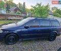 Синий Опель Астра, объемом двигателя 2 л и пробегом 350 тыс. км за 2600 $, фото 13 на Automoto.ua