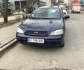Синий Опель Астра, объемом двигателя 2 л и пробегом 225 тыс. км за 3000 $, фото 1 на Automoto.ua