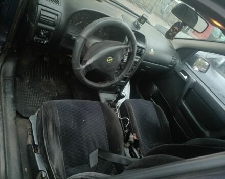 Синій Опель Астра, об'ємом двигуна 2 л та пробігом 323 тис. км за 2050 $, фото 5 на Automoto.ua